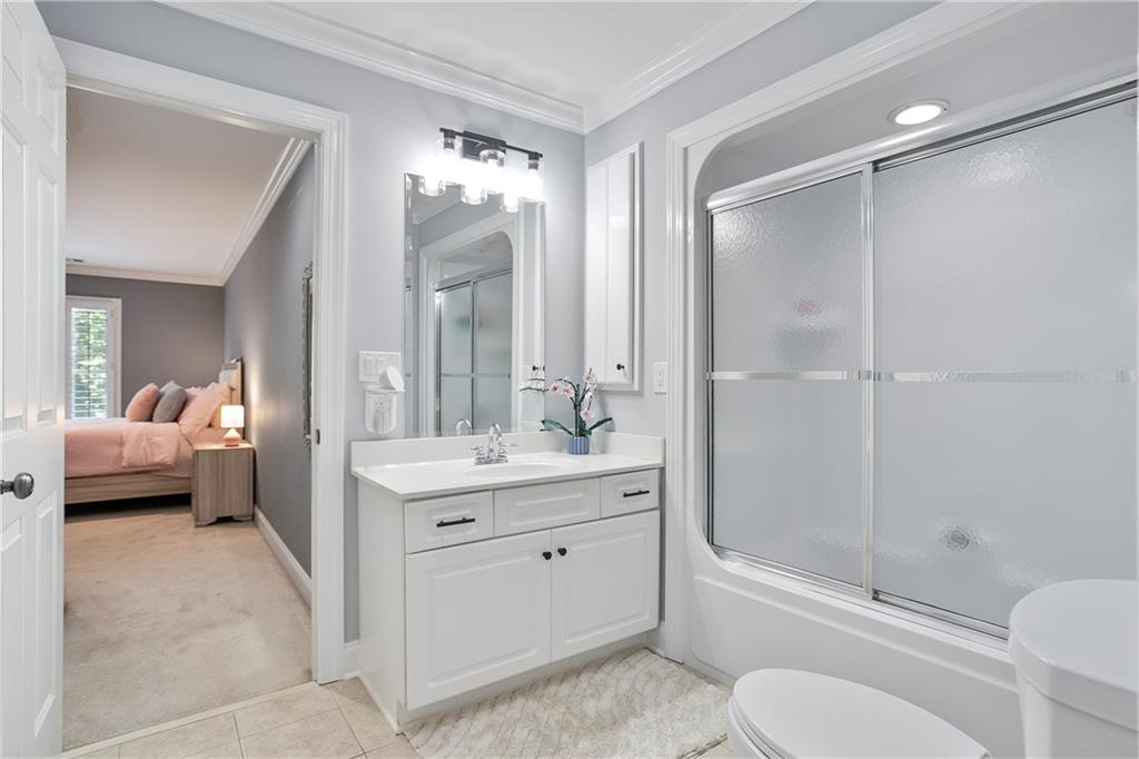 4185 Pool Road Winston, GA 30187 - Photo 37 of 57 a en suite bathroom with a toilet sink and shower