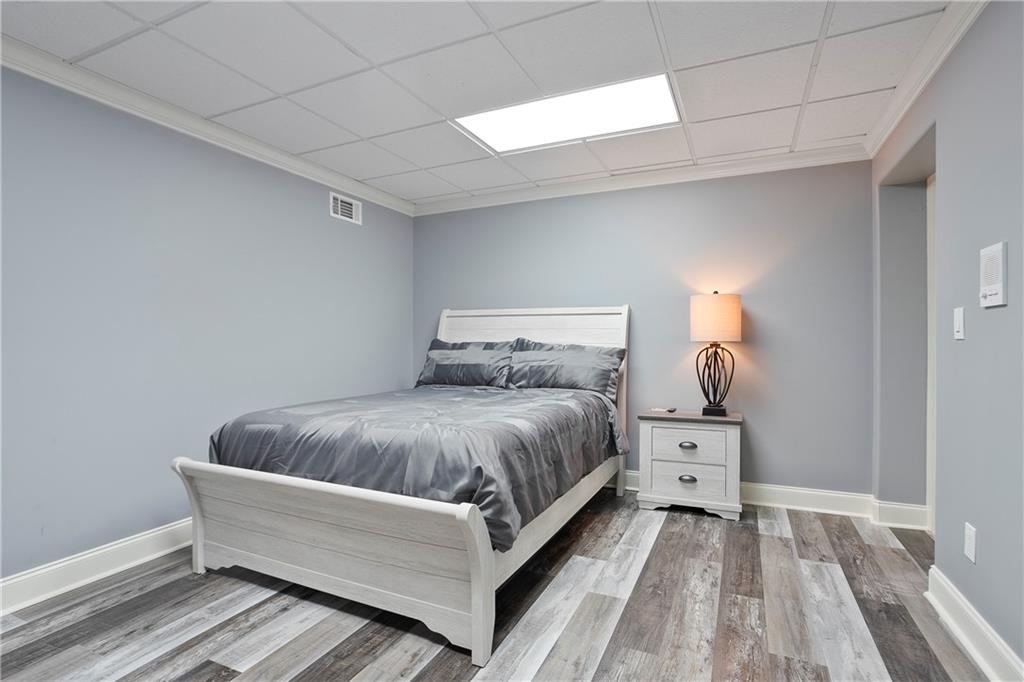 4185 Pool Road Winston, GA 30187 - Photo 50 of 57 a bed room with a bed and a couch