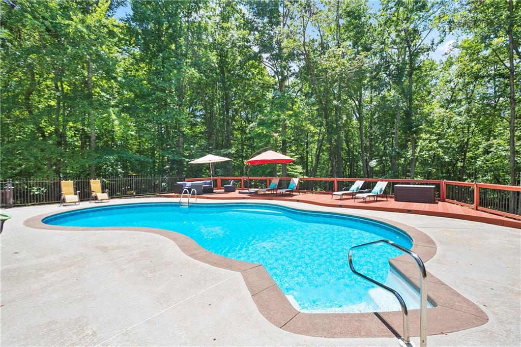 4185 Pool Road Winston, GA 30187 - Photo 54 of 57 a view of a swimming pool with an outdoor seating