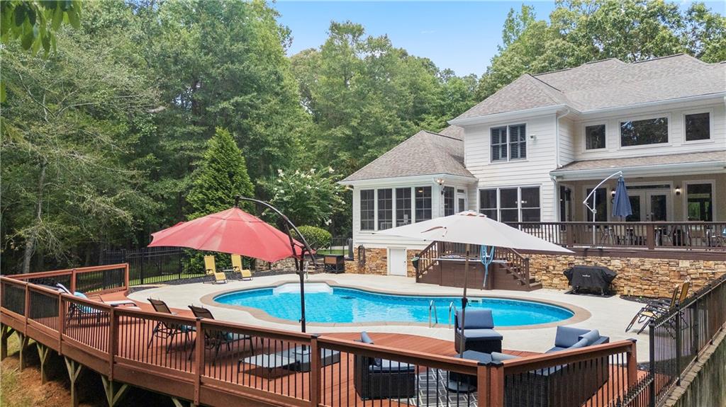 4185 Pool Road Winston, GA 30187 - Photo 55 of 57 a view of a house with swimming pool and a chairs