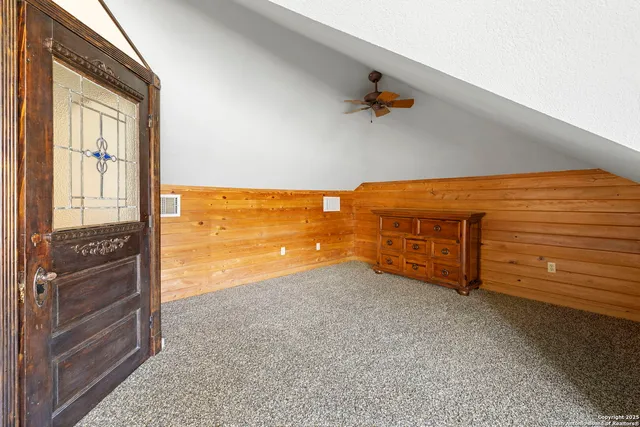 a view of a room with an entryway