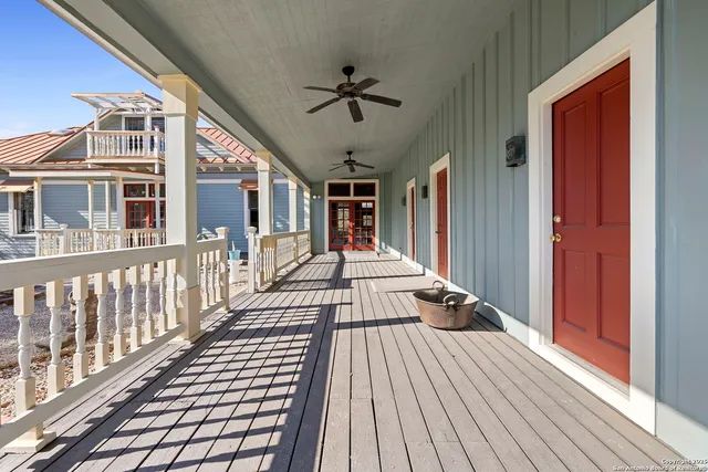 a view of a backyard with swimming pool