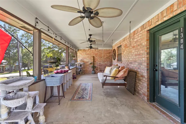 a living room with patio furniture