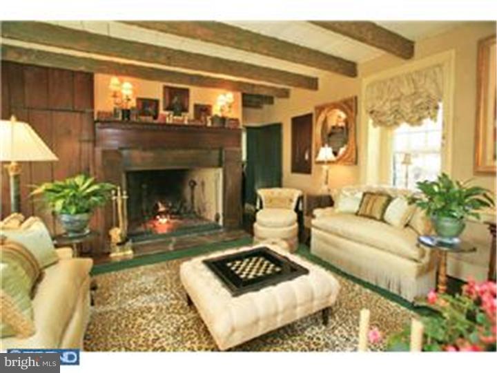 3451 Haupts Bridge Road Riegelsville, PA 18077 - Photo 12 of 23 a living room with furniture and a fireplace