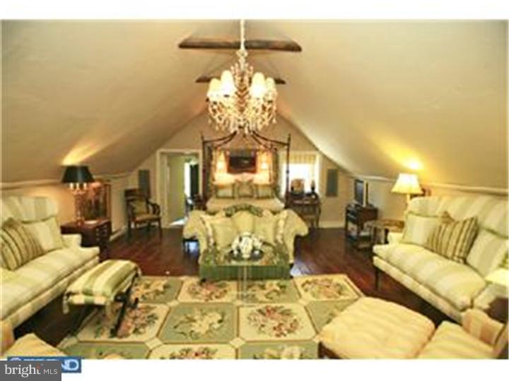 3451 Haupts Bridge Road Riegelsville, PA 18077 - Photo 17 of 23 a living room with furniture and a chandelier