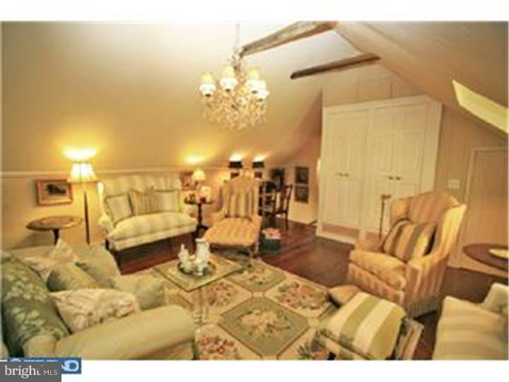 3451 Haupts Bridge Road Riegelsville, PA 18077 - Photo 19 of 23 a living room with furniture and a chandelier