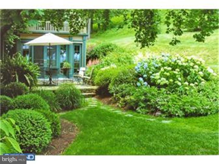 3451 Haupts Bridge Road Riegelsville, PA 18077 - Photo 7 of 23 a front view of a house with a yard