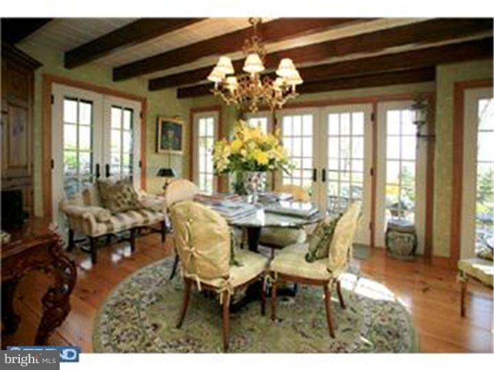 3451 Haupts Bridge Road Riegelsville, PA 18077 - Photo 9 of 23 a view of a dining room with furniture and wooden floor