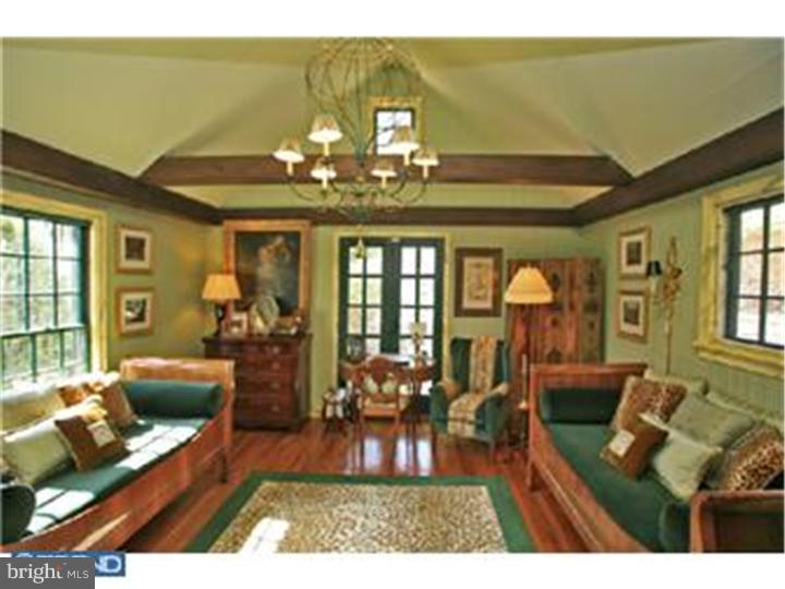 3451 Haupts Bridge Road Riegelsville, PA 18077 - Photo 10 of 23 a living room with furniture and a chandelier