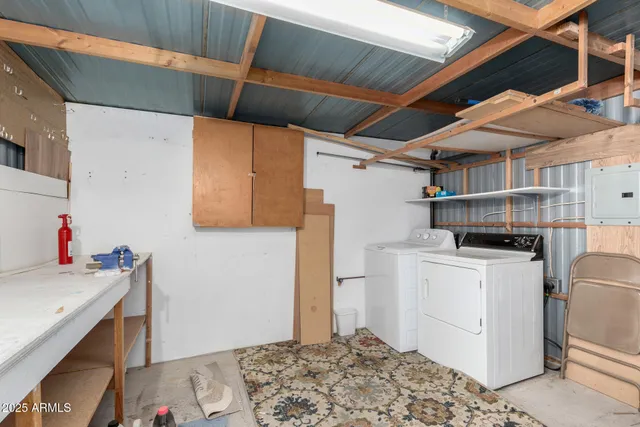 a storage room with washer and dryer