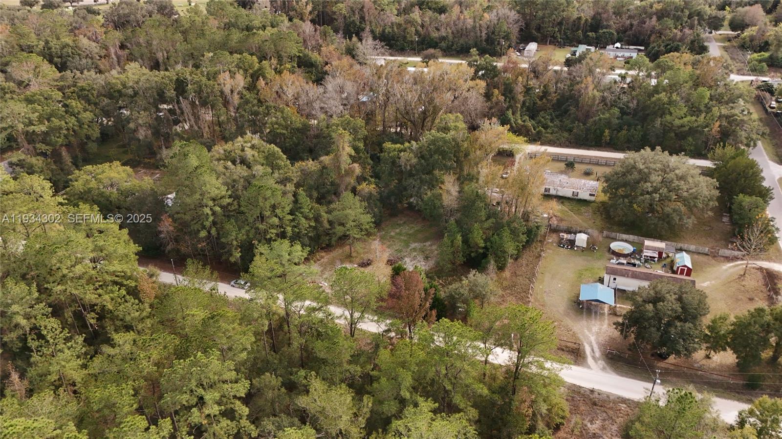 0 Southwest 2nd Court Ocala, FL 34476 - Photo 11 of 21 an aerial view of residential houses with outdoor space and trees