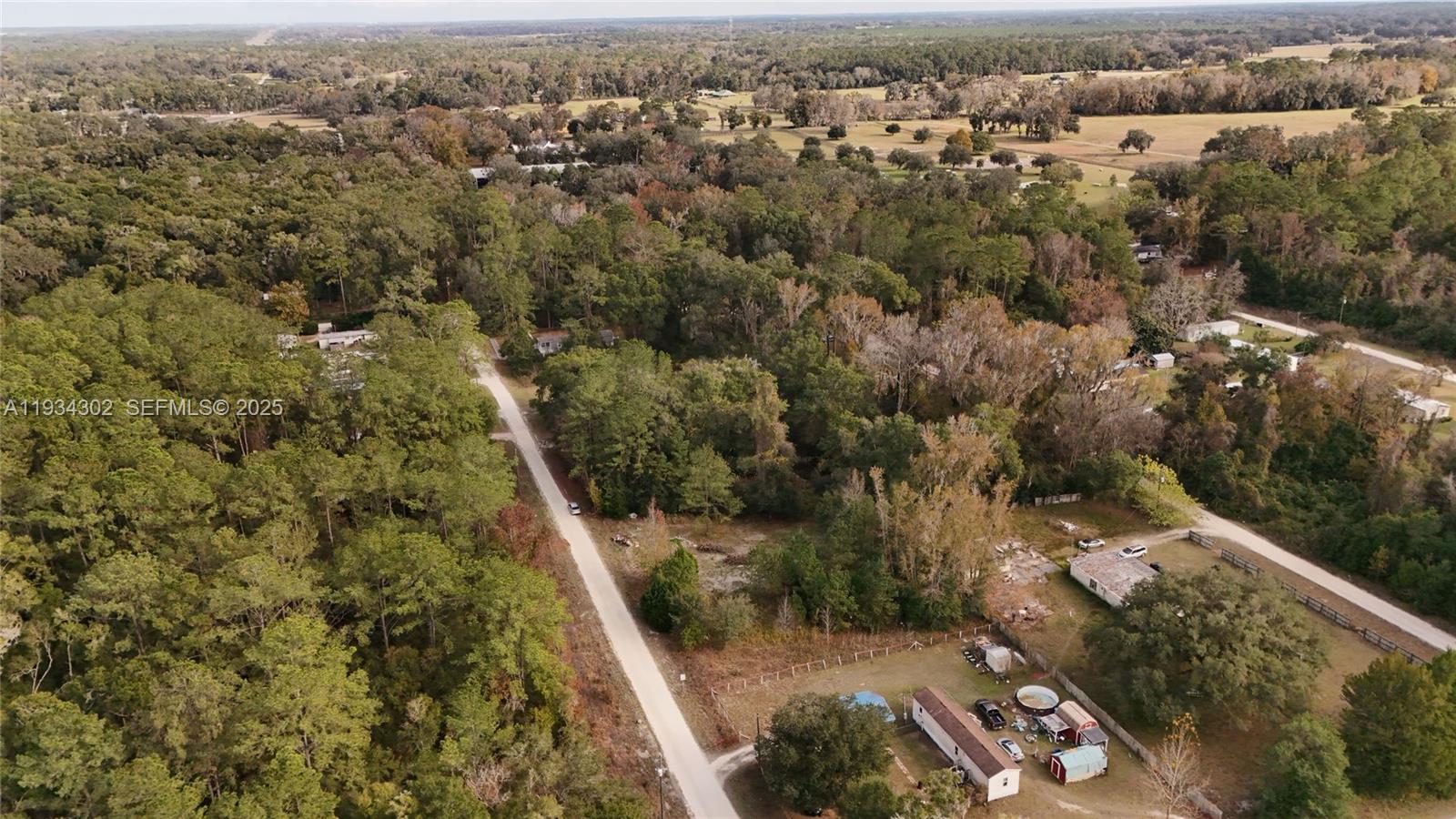 0 Southwest 2nd Court Ocala, FL 34476 - Photo 16 of 21 an aerial view of a house with a yard
