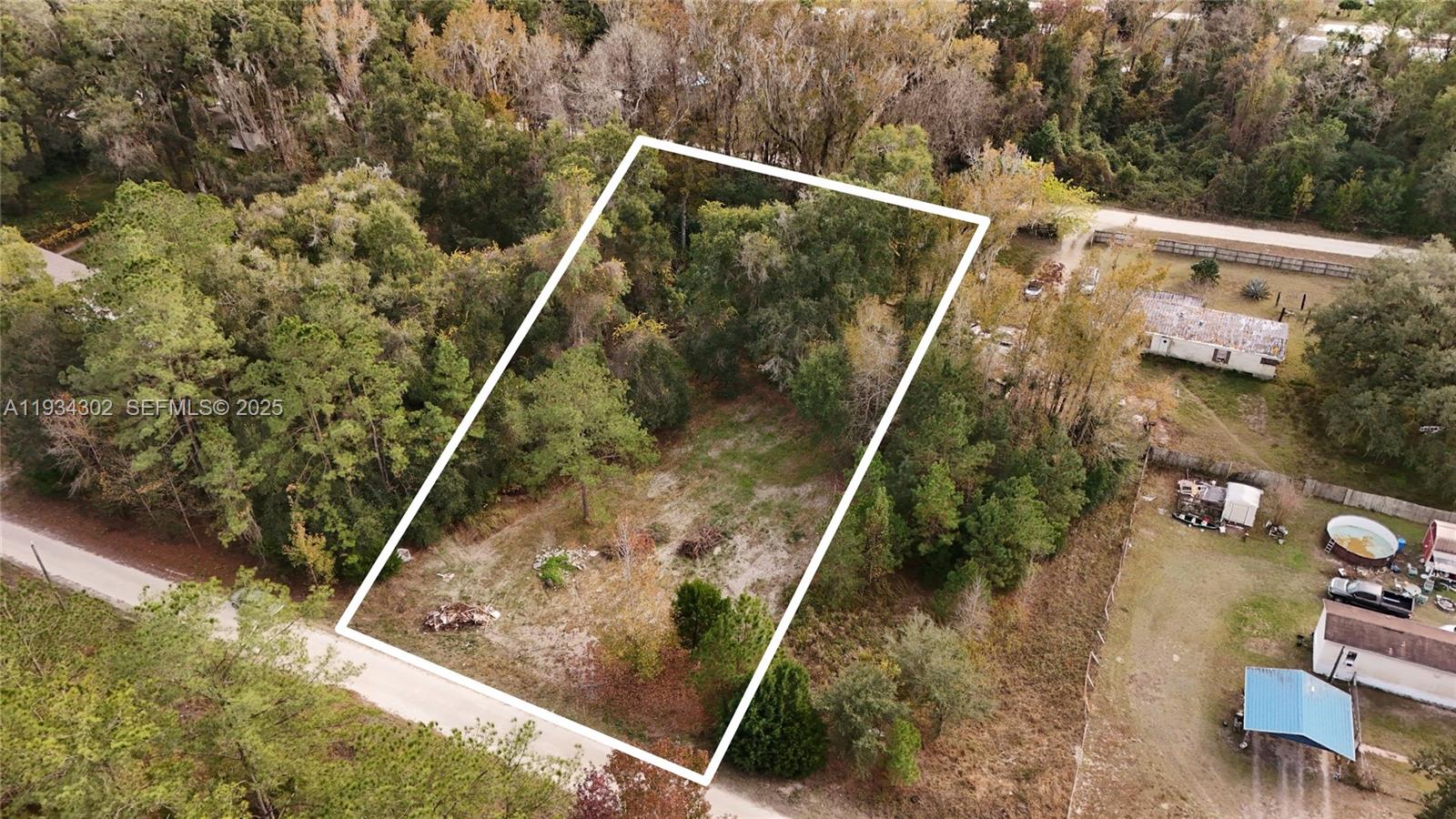 0 Southwest 2nd Court Ocala, FL 34476 - Photo 2 of 21 a view of roof deck with chair and wooden floor