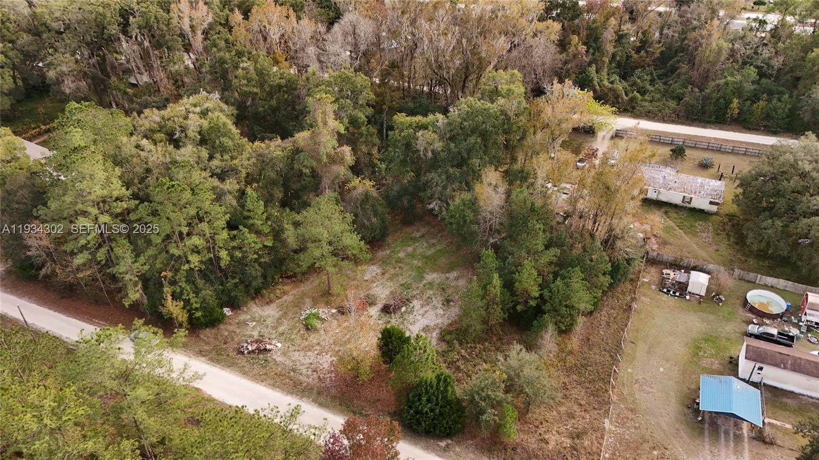 0 Southwest 2nd Court Ocala, FL 34476 - Photo 4 of 21 an aerial view of a house with a yard