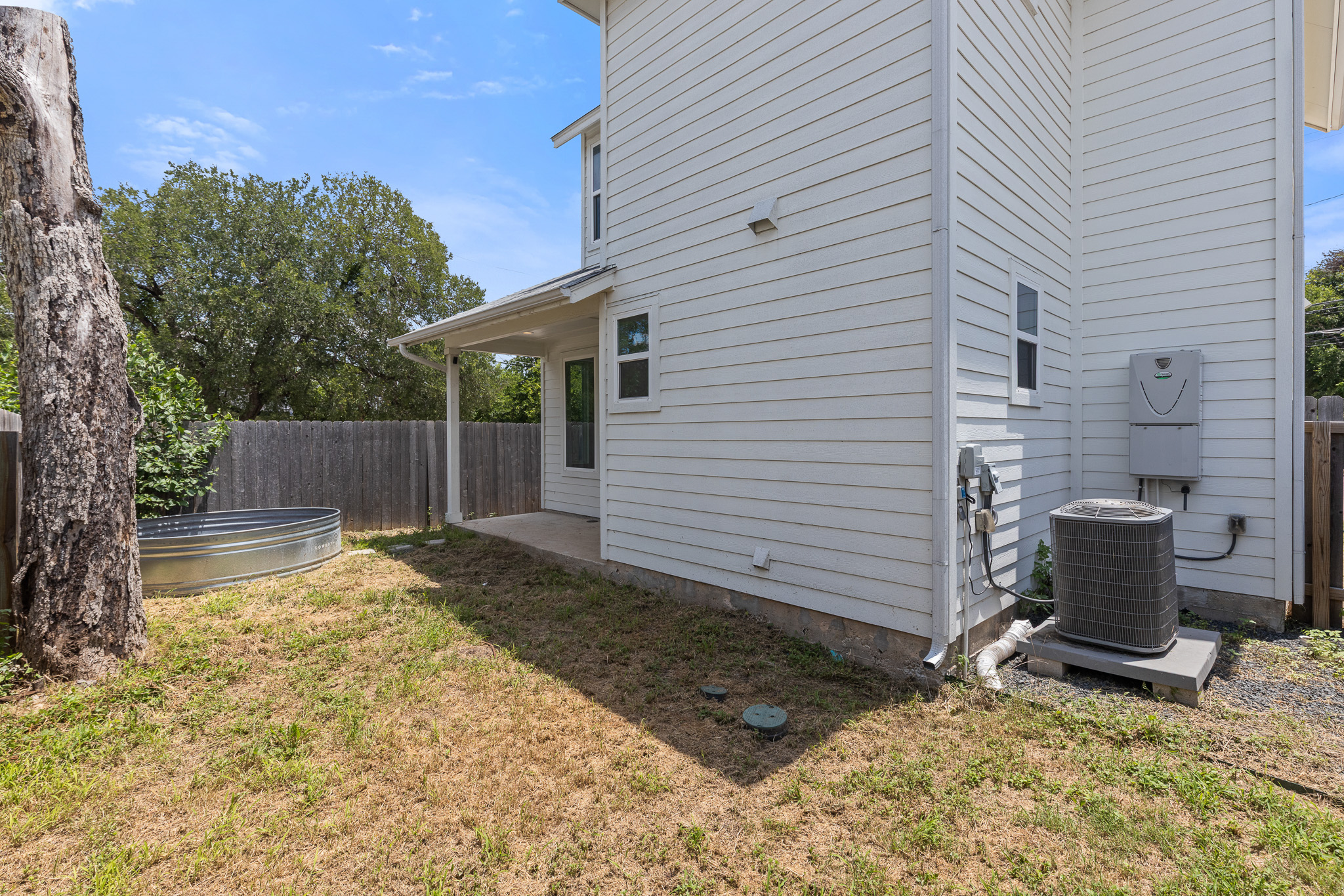 2604 Wheless Lane, Unit 1 Austin, TX 78723 - Photo 33 of 38 Perfect outdoor retreat for weekend gatherings, entertaining, or quiet evenings under Texas skies.