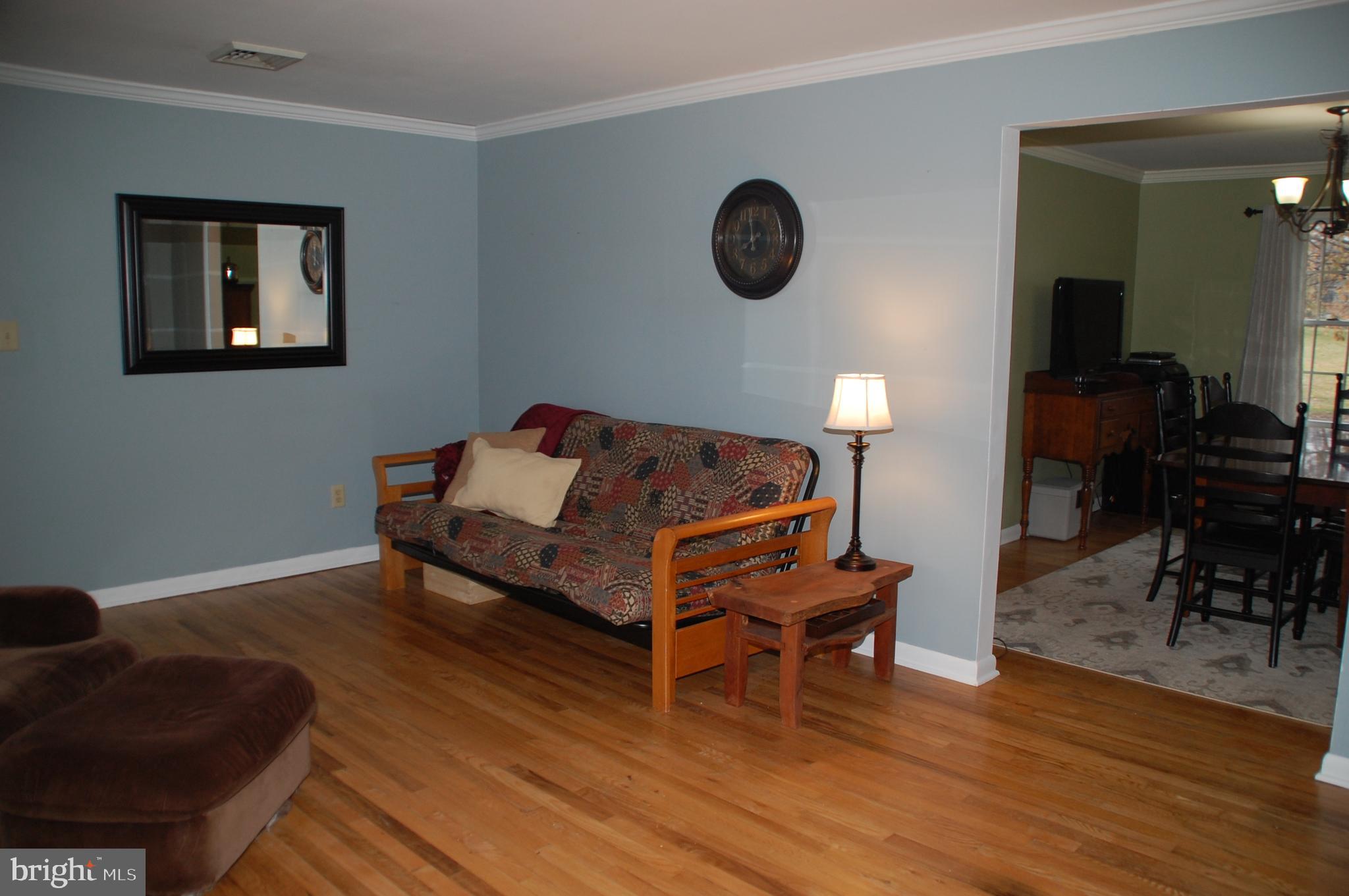 664 Godshall Road Telford, PA 18969 - Photo 11 of 42 The Living Room opens to the Dining Room...