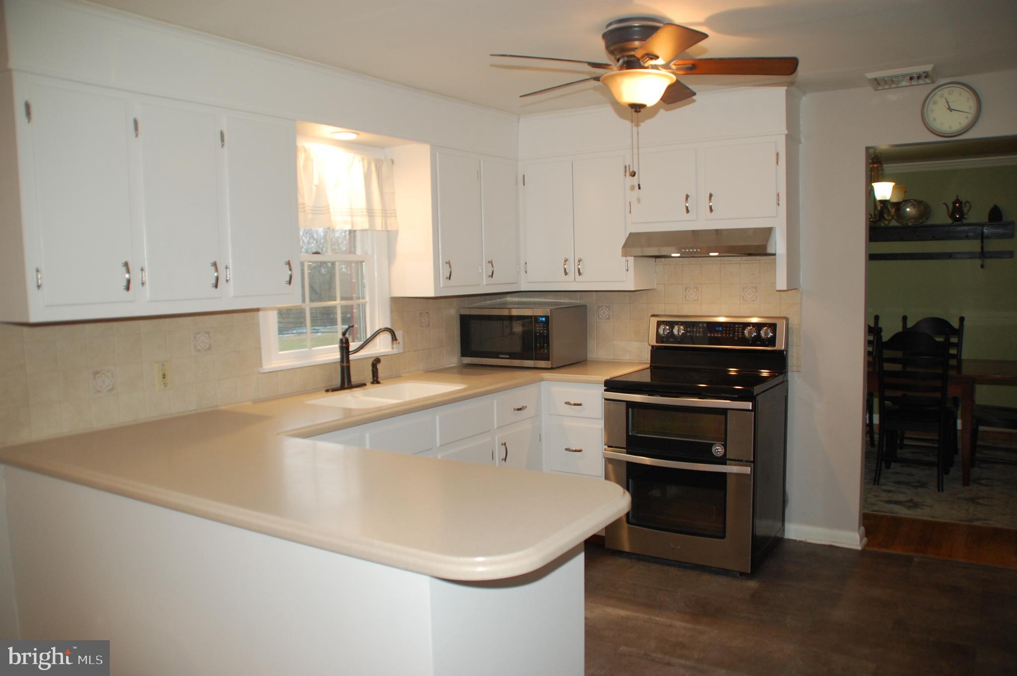 664 Godshall Road Telford, PA 18969 - Photo 15 of 42 Corian counters & a pantry complete the Kitchen.
