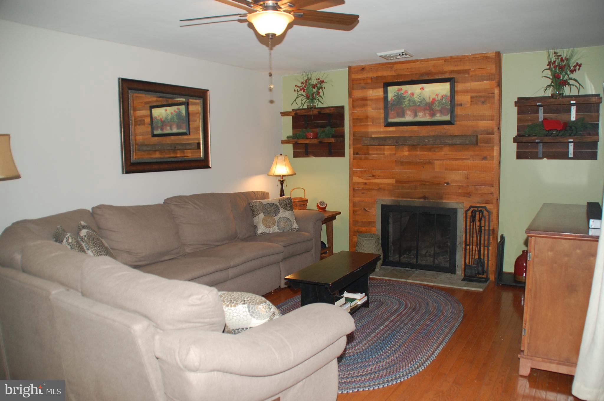 664 Godshall Road Telford, PA 18969 - Photo 17 of 42 The Family Room with stylishly finished fireplace