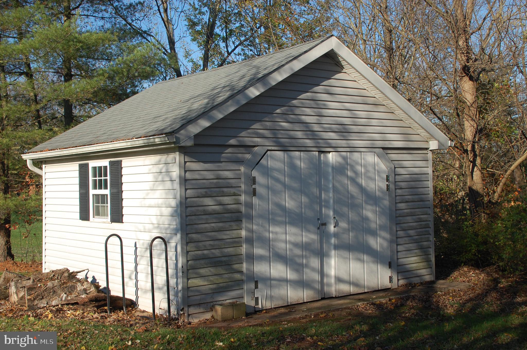 664 Godshall Road Telford, PA 18969 - Photo 31 of 42 Storage building with electric on concrete slab...