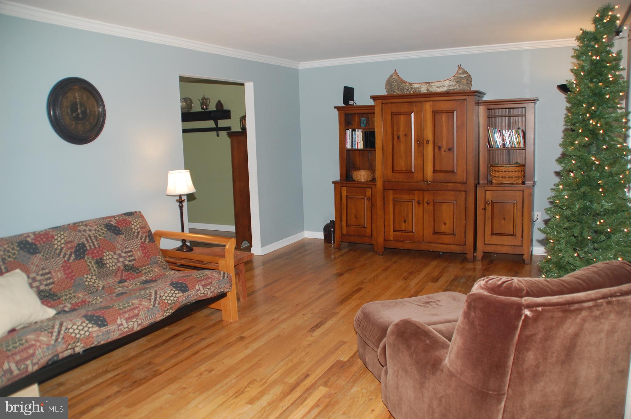 664 Godshall Road Telford, PA 18969 - Photo 8 of 42 The Living Room is finished with crown molding...
