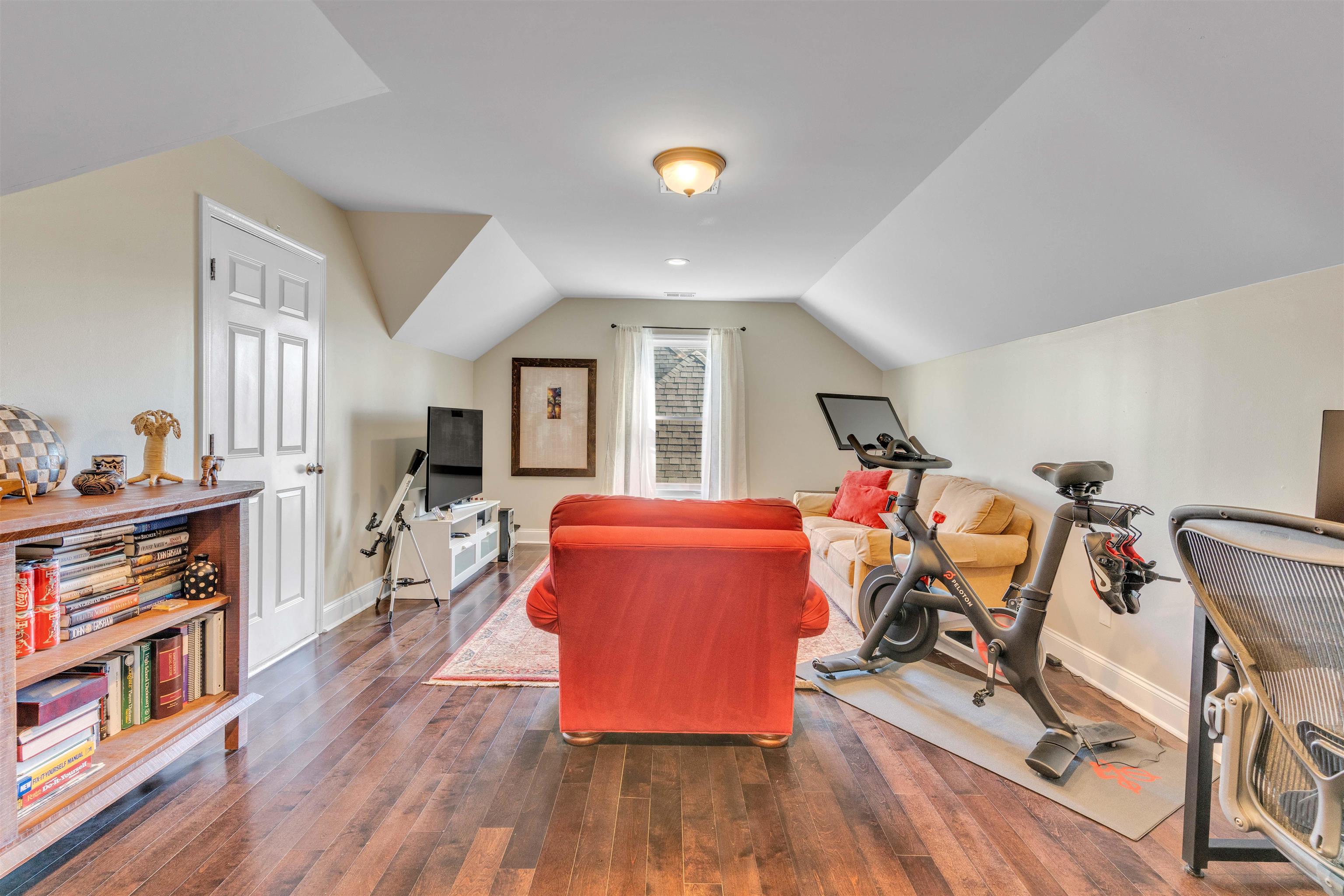 10489 Fireweek Lane Collierville, TN 38017 - Photo 20 of 39 a view of room with guitars and wooden floor