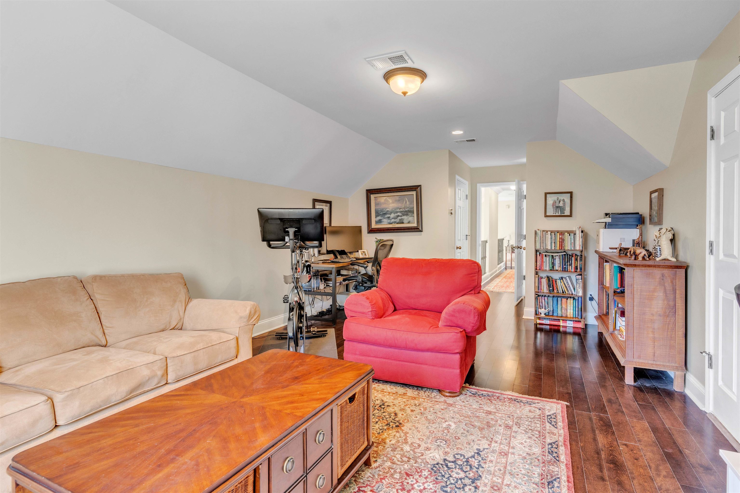 10489 Fireweek Lane Collierville, TN 38017 - Photo 22 of 39 a living room with furniture and a wooden floor