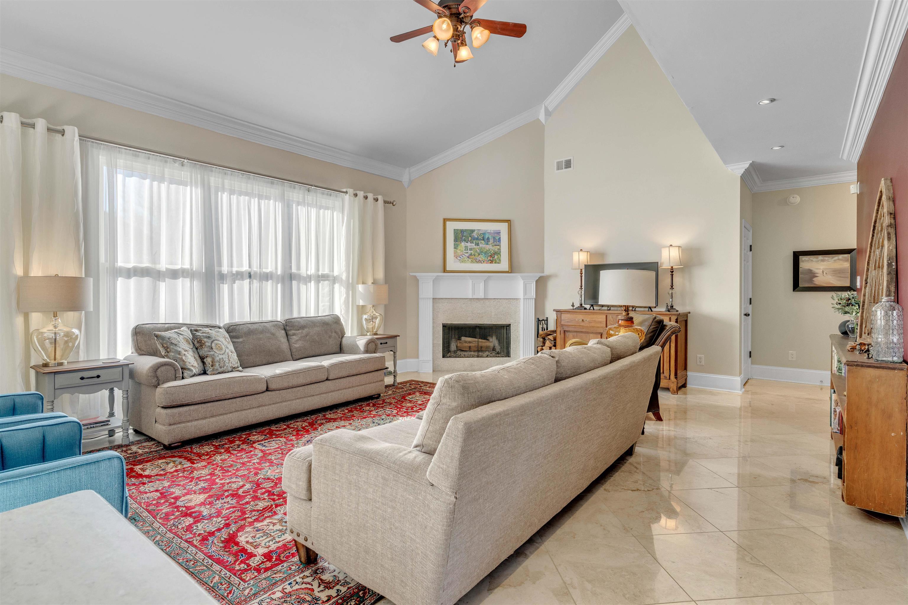 10489 Fireweek Lane Collierville, TN 38017 - Photo 3 of 39 a living room with furniture and a fireplace