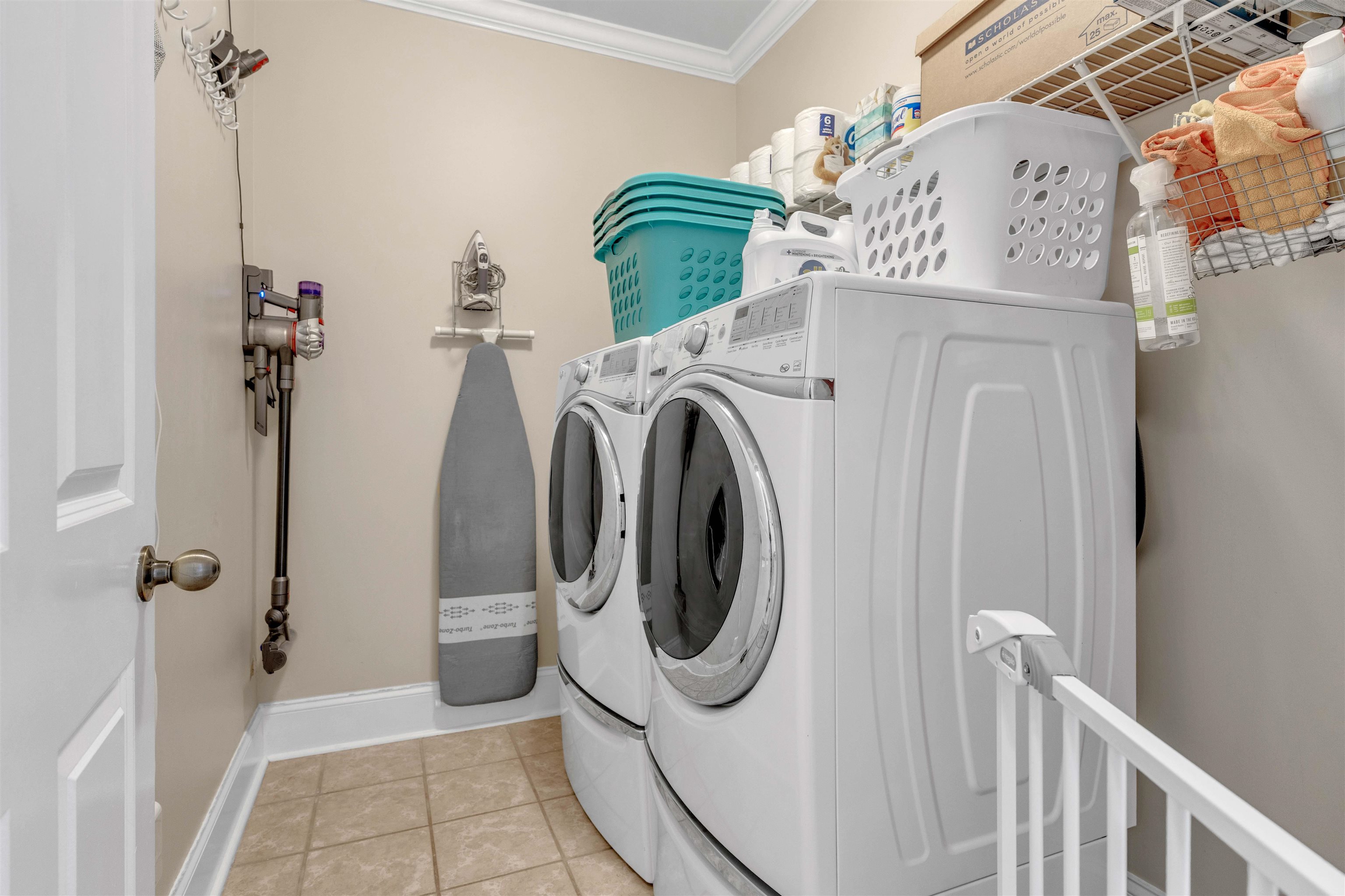 10489 Fireweek Lane Collierville, TN 38017 - Photo 31 of 39 a utility room with dryer and washer