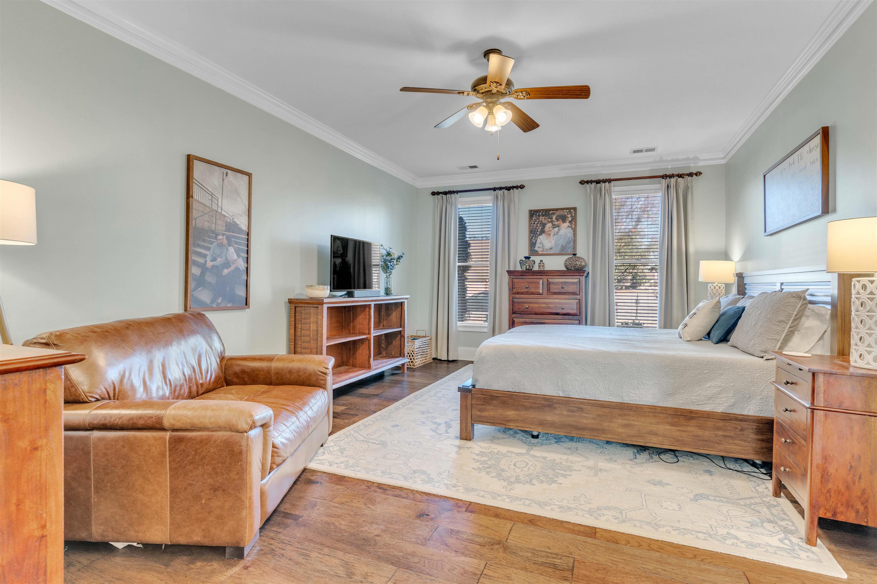 10489 Fireweek Lane Collierville, TN 38017 - Photo 10 of 39 a living room with furniture and a flat screen tv