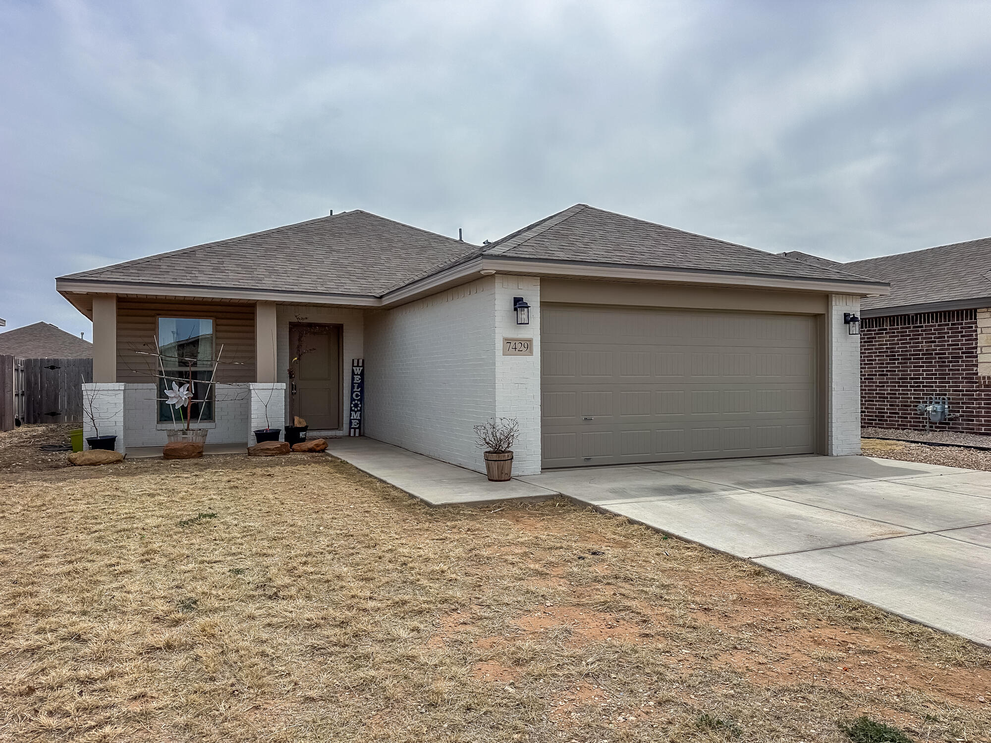 7429 31st Street Lubbock, TX 79407 - Photo 2 of 29 a house with yard in front of it