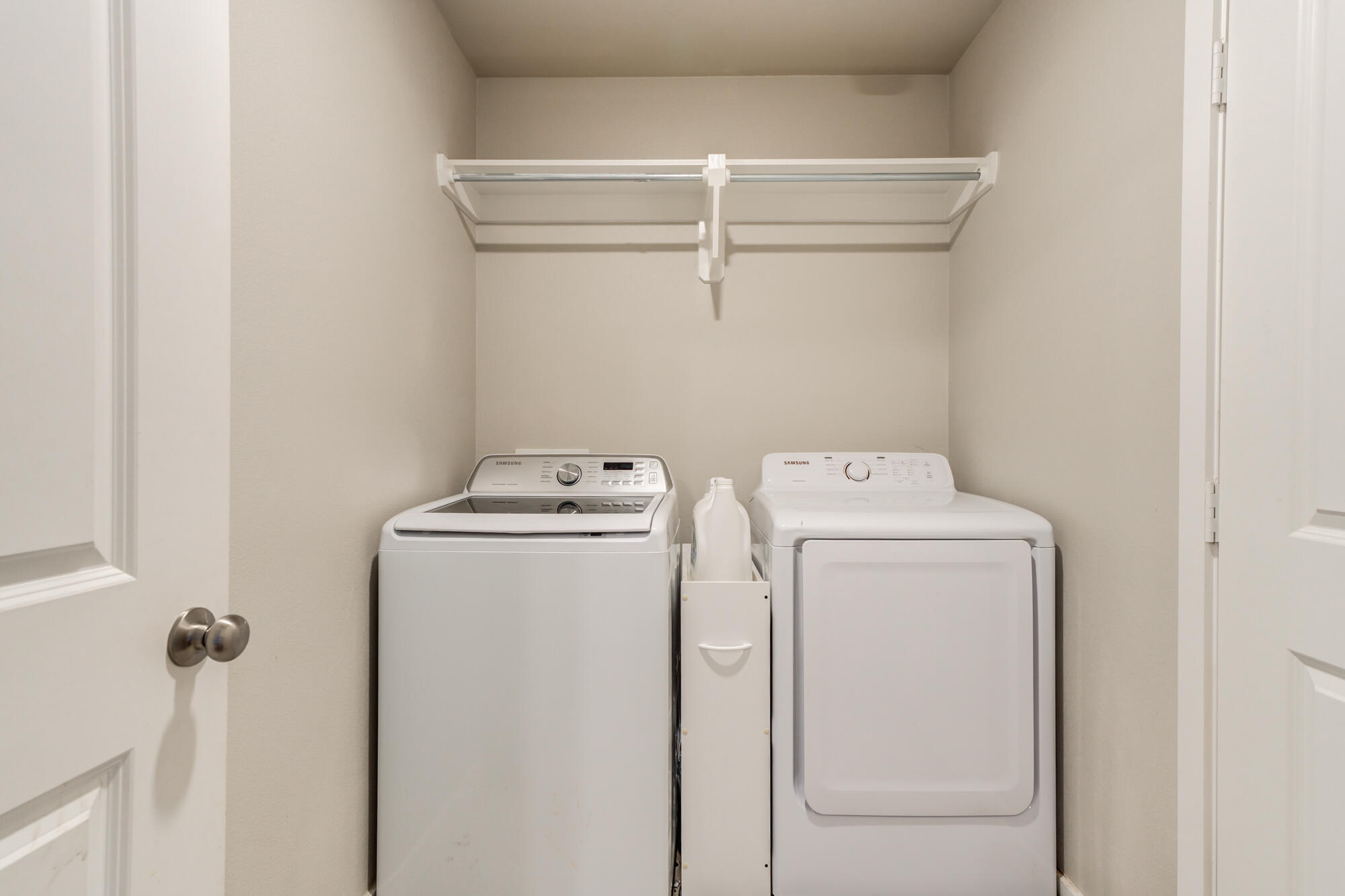 7429 31st Street Lubbock, TX 79407 - Photo 26 of 29 a utility room with dryer and washer
