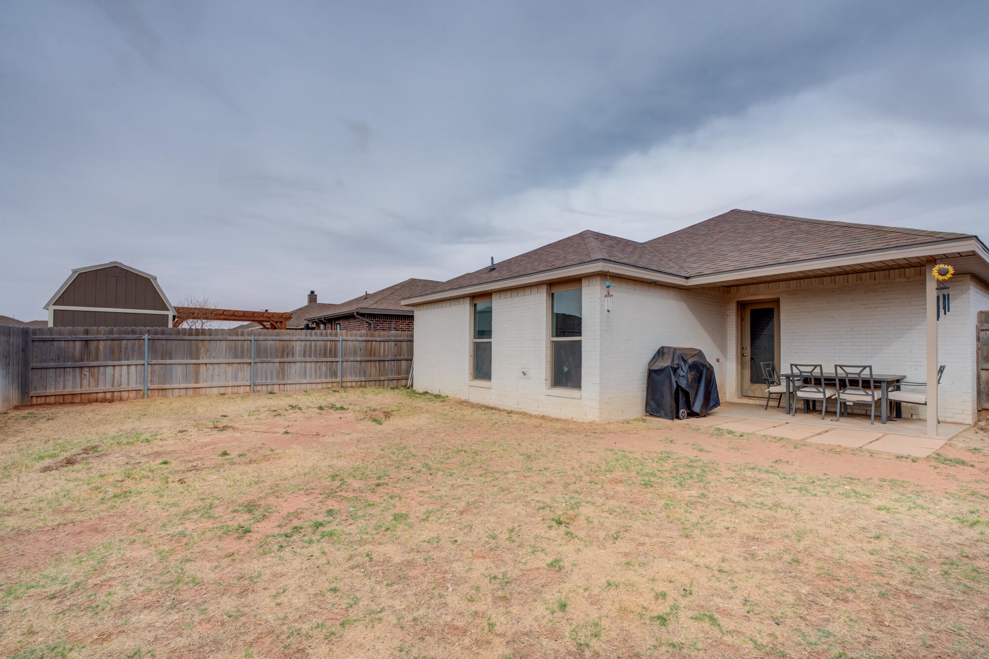 7429 31st Street Lubbock, TX 79407 - Photo 28 of 29 a view of a house with yard and sitting area