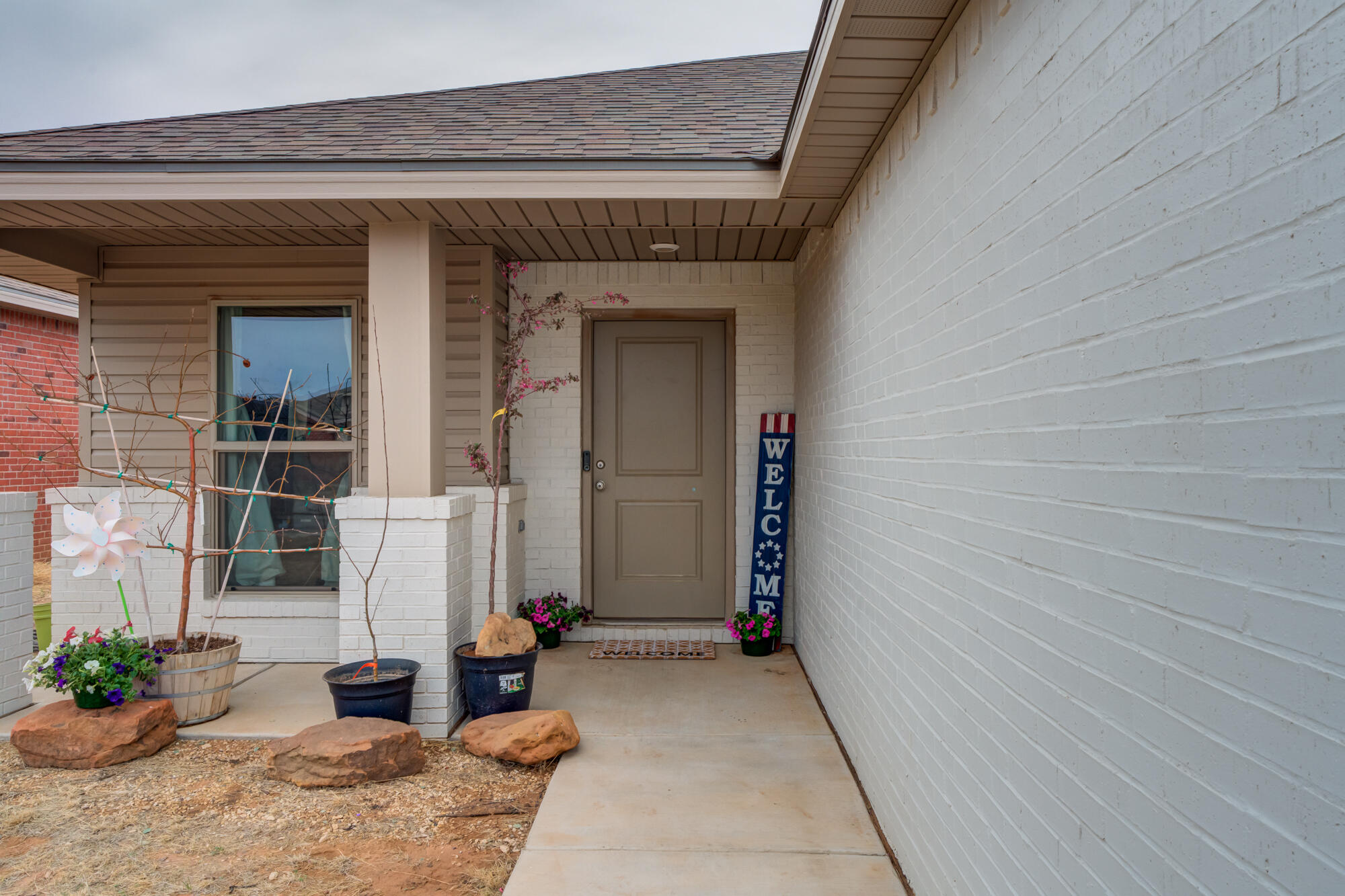 7429 31st Street Lubbock, TX 79407 - Photo 3 of 29 a view of entryway with a rug