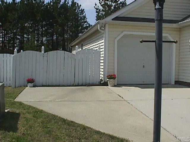 5004 Gable Ridge Drive Durham, NC 27713 - Photo 5 of 6 a view of entrance gate and yard