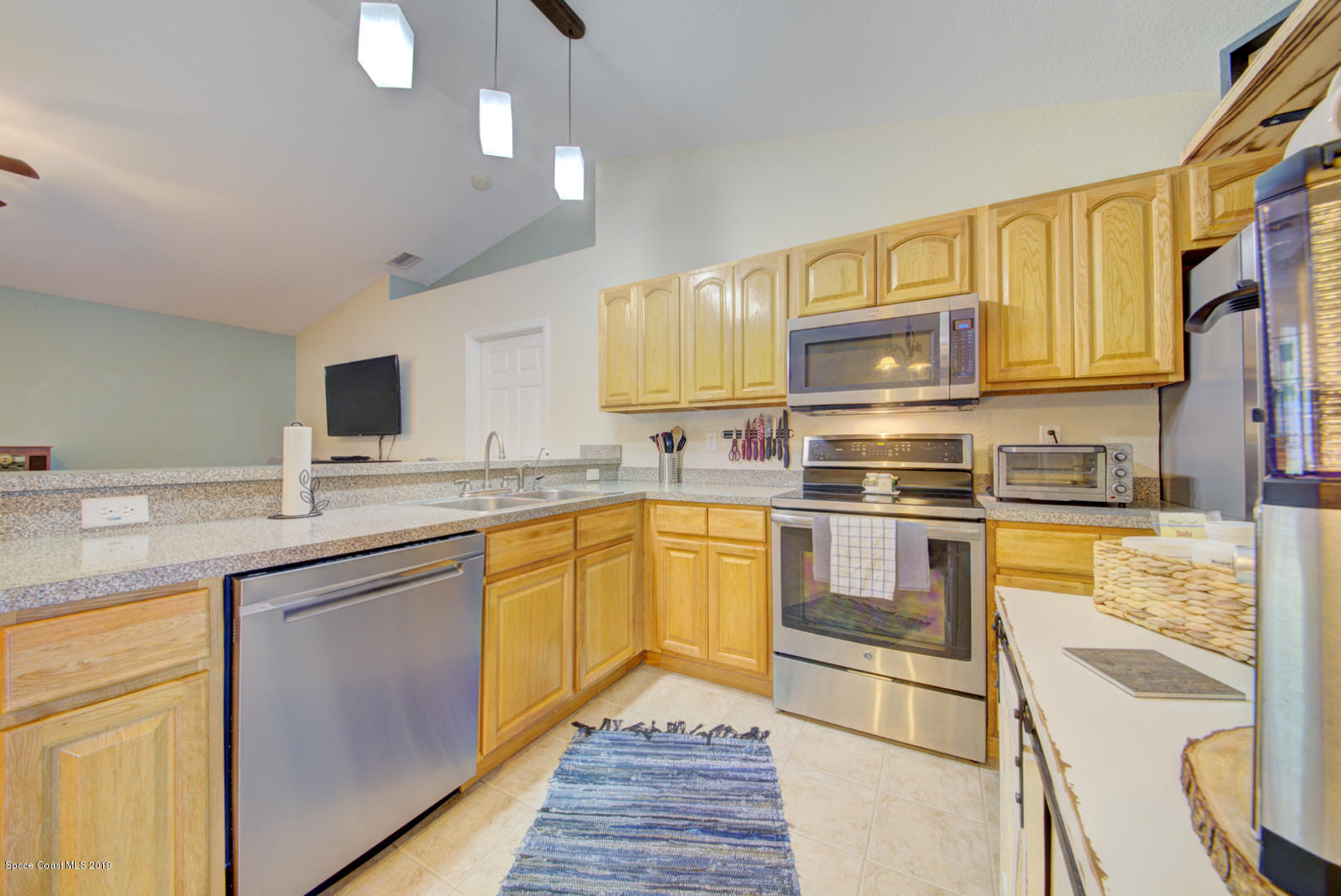 419 Hamer Road Southwest Palm Bay, FL 32908 - Photo 11 of 33 kitchen with stainless appliances