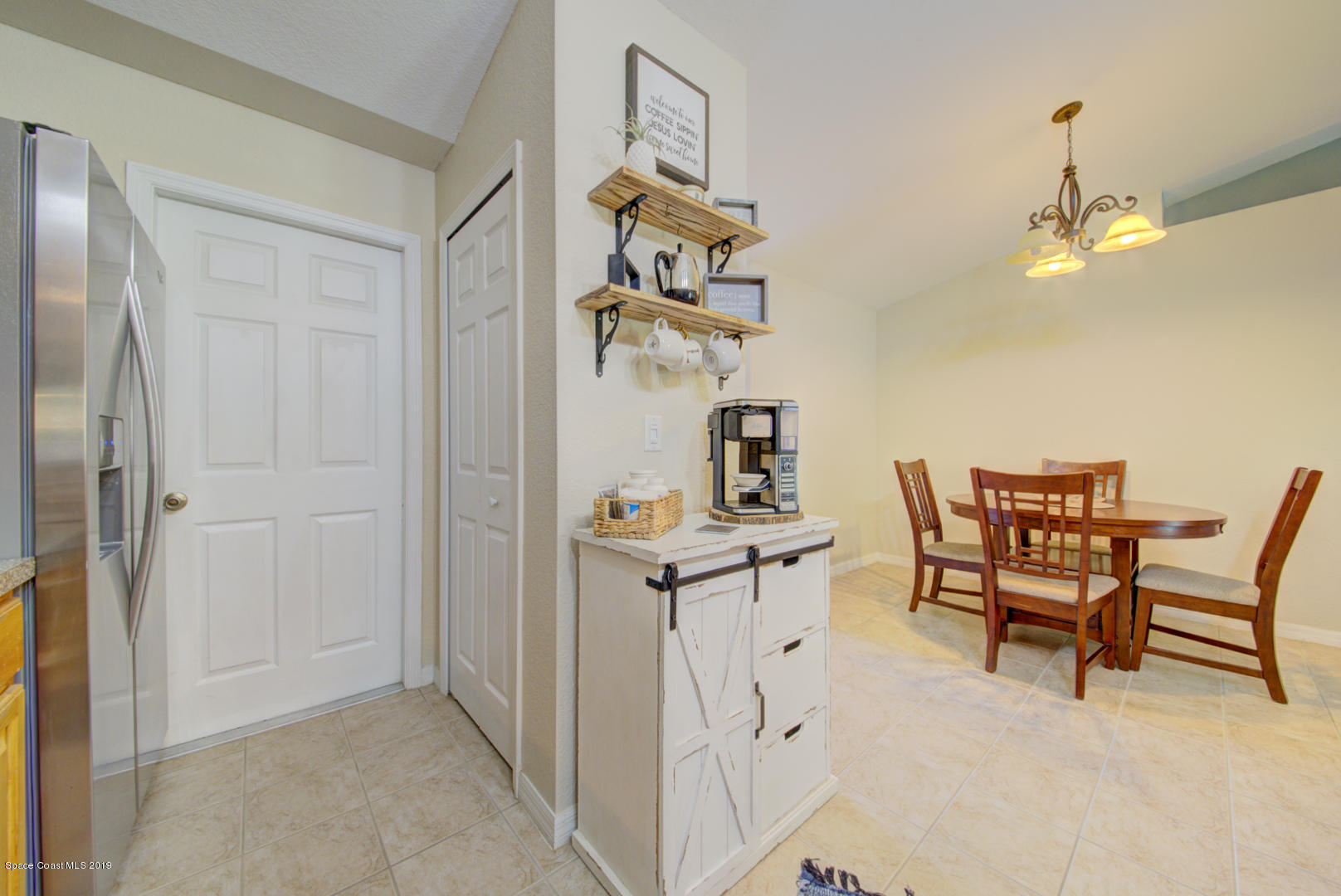 419 Hamer Road Southwest Palm Bay, FL 32908 - Photo 12 of 33 kitchen open to dining area