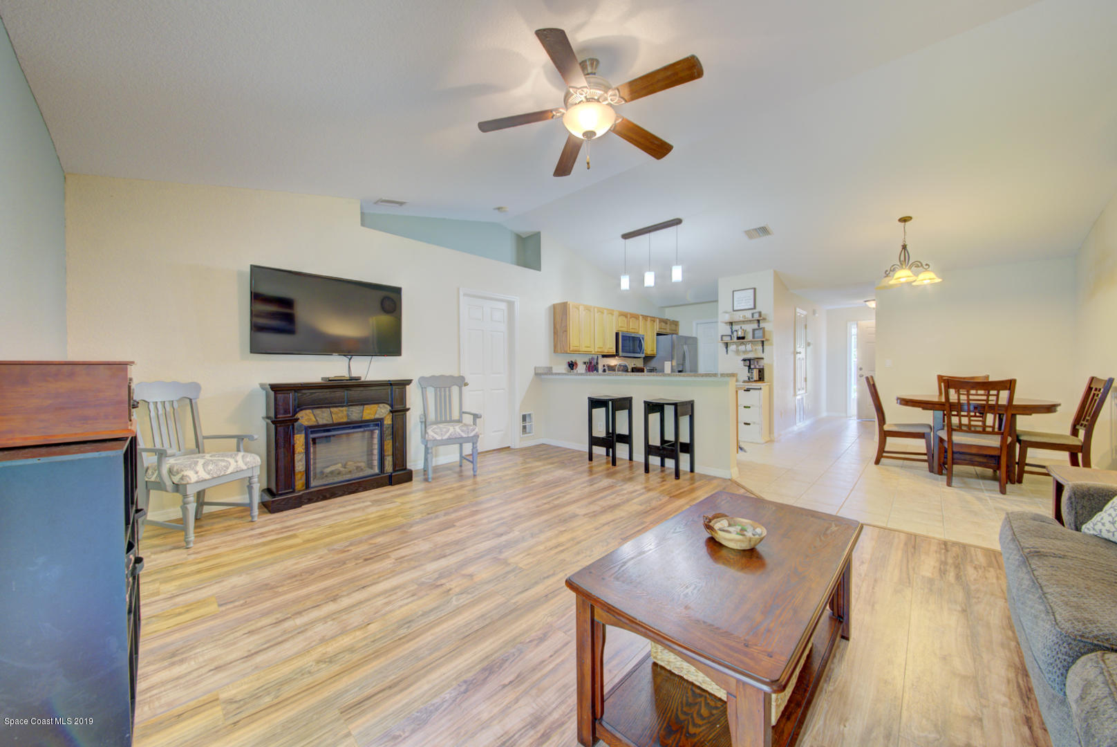 419 Hamer Road Southwest Palm Bay, FL 32908 - Photo 15 of 33 living room open to kitchen