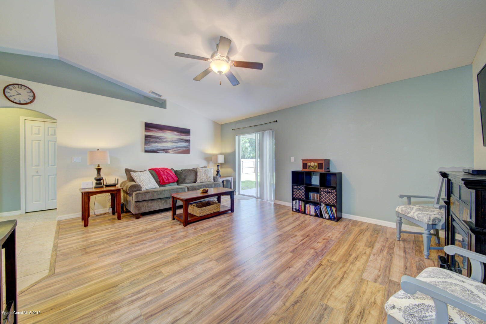 419 Hamer Road Southwest Palm Bay, FL 32908 - Photo 16 of 33 living room with vaulted ceiling