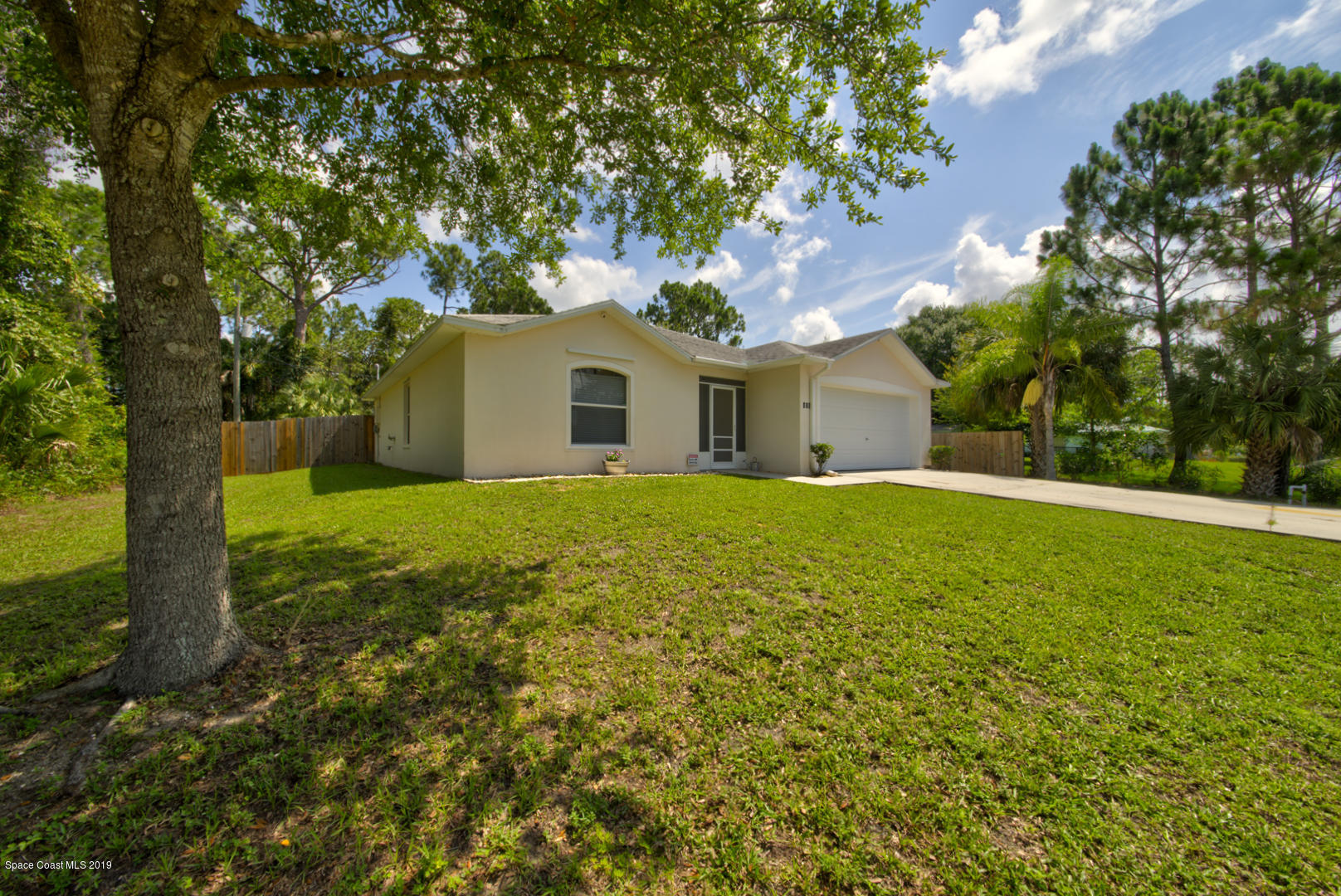 419 Hamer Road Southwest Palm Bay, FL 32908 - Photo 3 of 33 front of house left