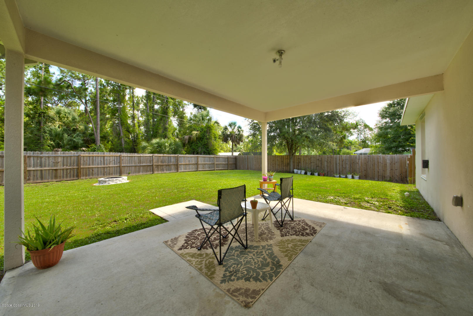 419 Hamer Road Southwest Palm Bay, FL 32908 - Photo 29 of 33 covered patio