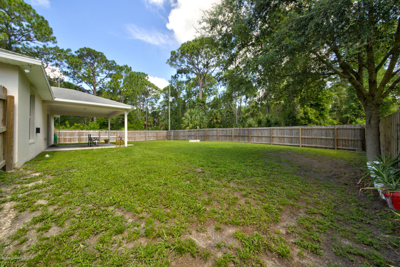 419 Hamer Road Southwest Palm Bay, FL 32908 - Photo 30 of 33 fenced in backyard
