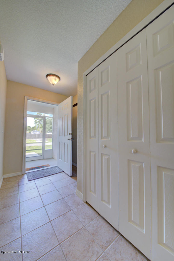 419 Hamer Road Southwest Palm Bay, FL 32908 - Photo 5 of 33 foyer