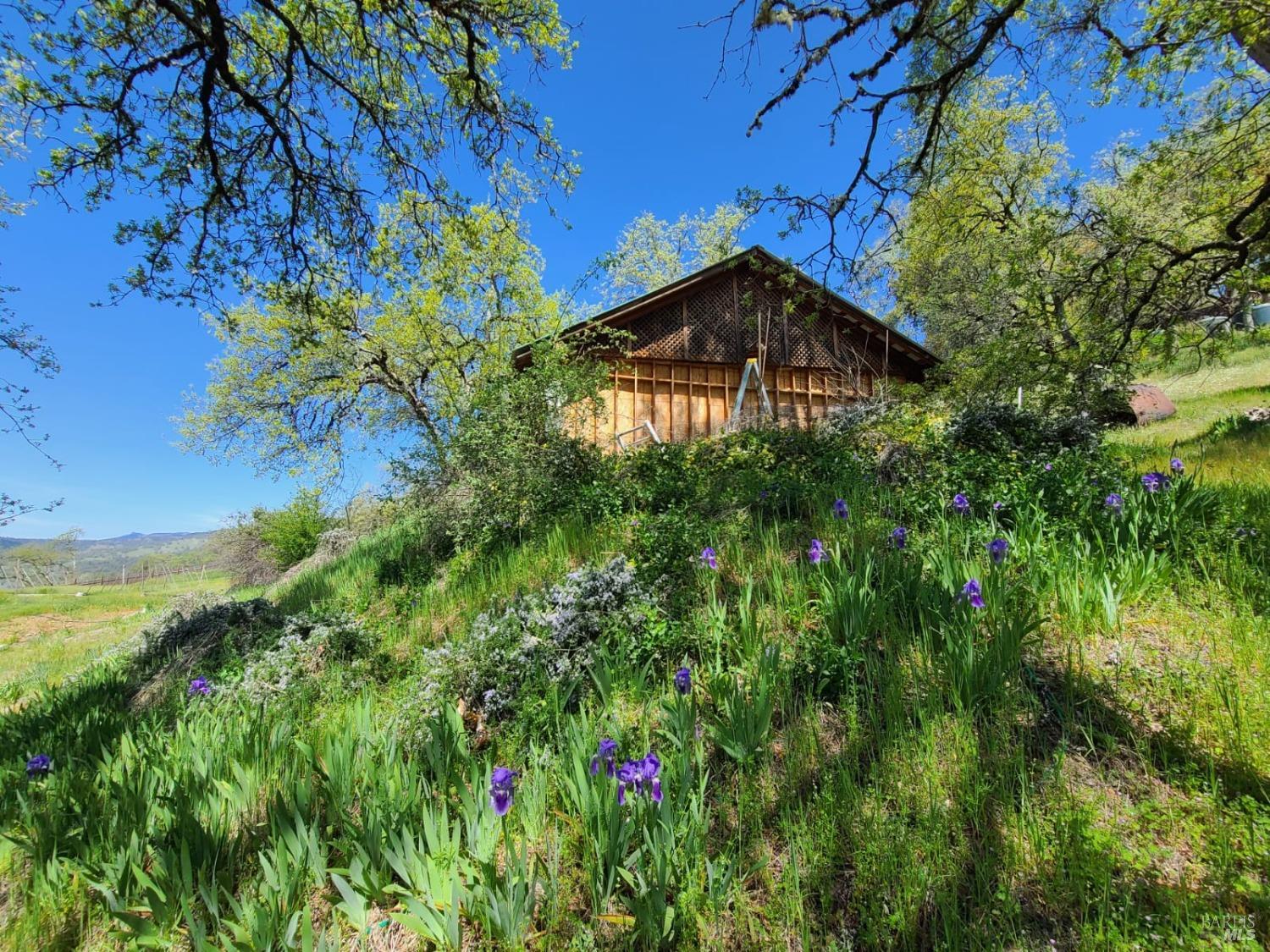 35776 Mendocino Pass Road Covelo, CA 95428 - Photo 1 of 33 a view of a houses with a yard