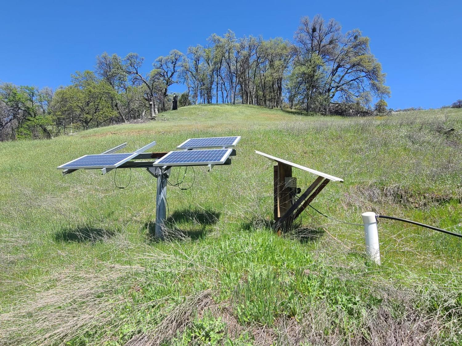 35776 Mendocino Pass Road Covelo, CA 95428 - Photo 5 of 33 a backyard of a house with lots of green space