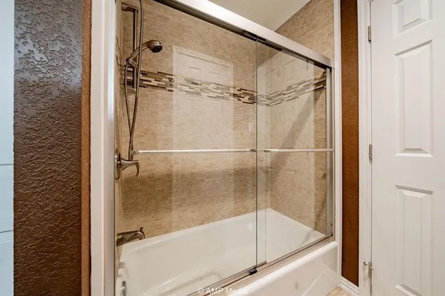 a bathroom with a bath tub