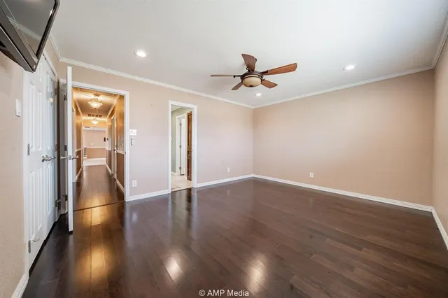 a room with a white cabinets and window