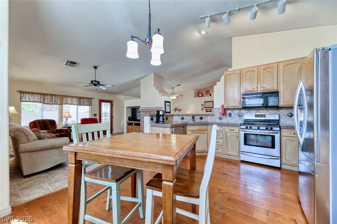 2001 Appaloosa Road Henderson, NV 89002 - Photo 23 of 44 This open concept kitchen and living area offers comfortable gathering spaces and modern conveniences.