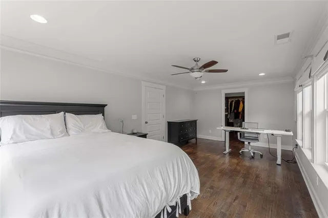 a bed room with a bed and furniture