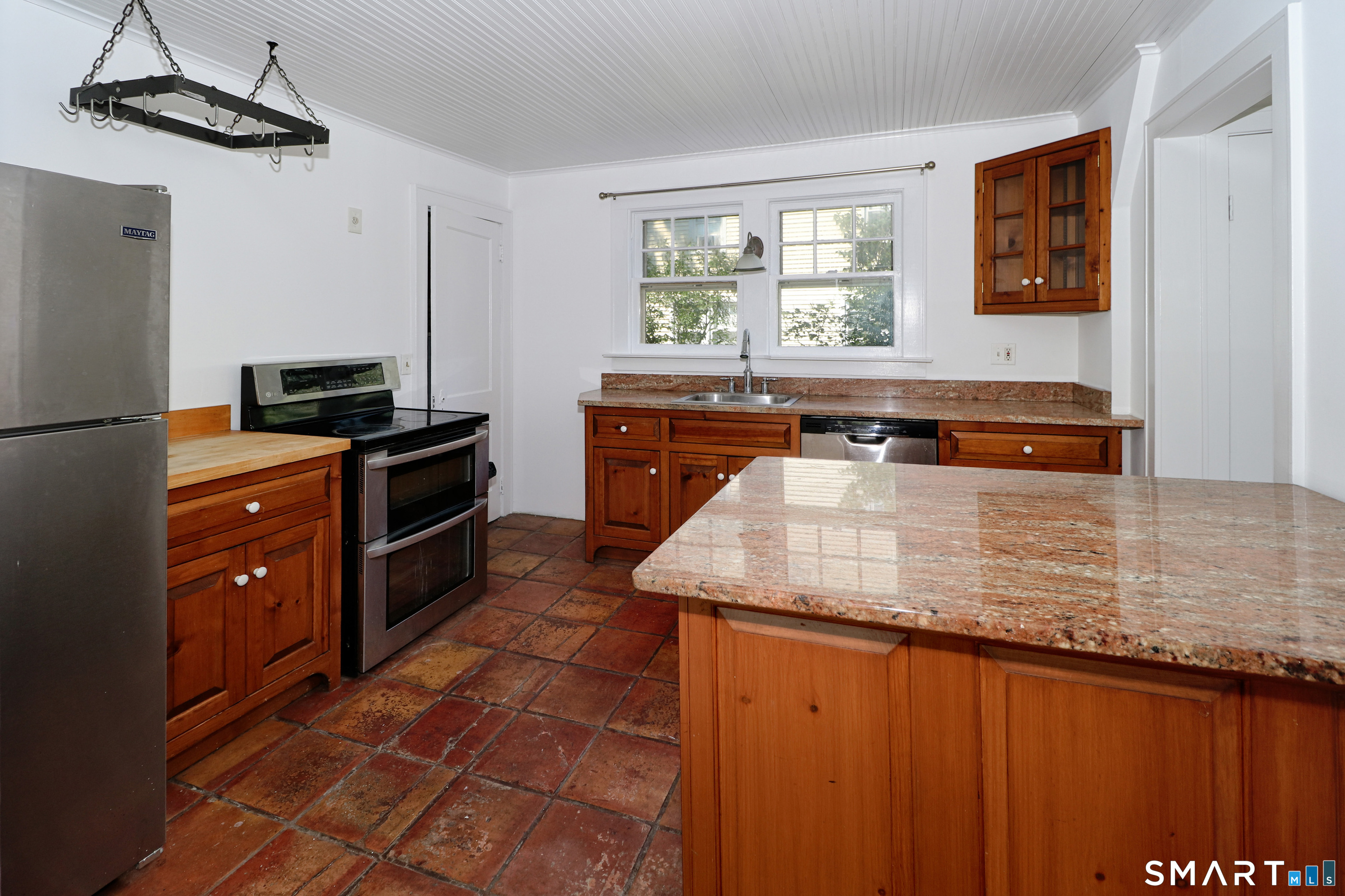104 Henderson Road Fairfield, CT 06824 - Photo 14 of 26 Eat-Kitchen with Peninsula and Granite Counters