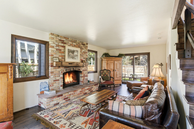 2635 Little Kate Road, Unit 21 Park City, UT 84060 - Photo 5 of 39 Living area with dark wood-style flooring and a fireplace
